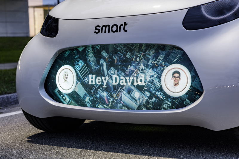 Illustration for article titled The Fully-Autonomous Electric Smart ForTwo Concept Car Has A Grille That Will Greet You With 'Hey'